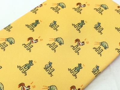 HERMES エルメス ネクタイ 動物 アニマル 黄色 イエロー 柄 総柄